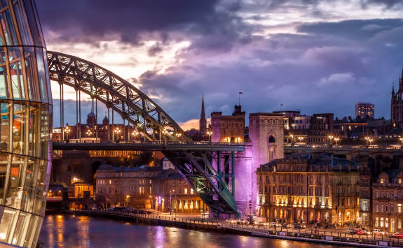 The Tyne Bridge as seen from the Glass House. Purple tinted lights brighten Newcastle